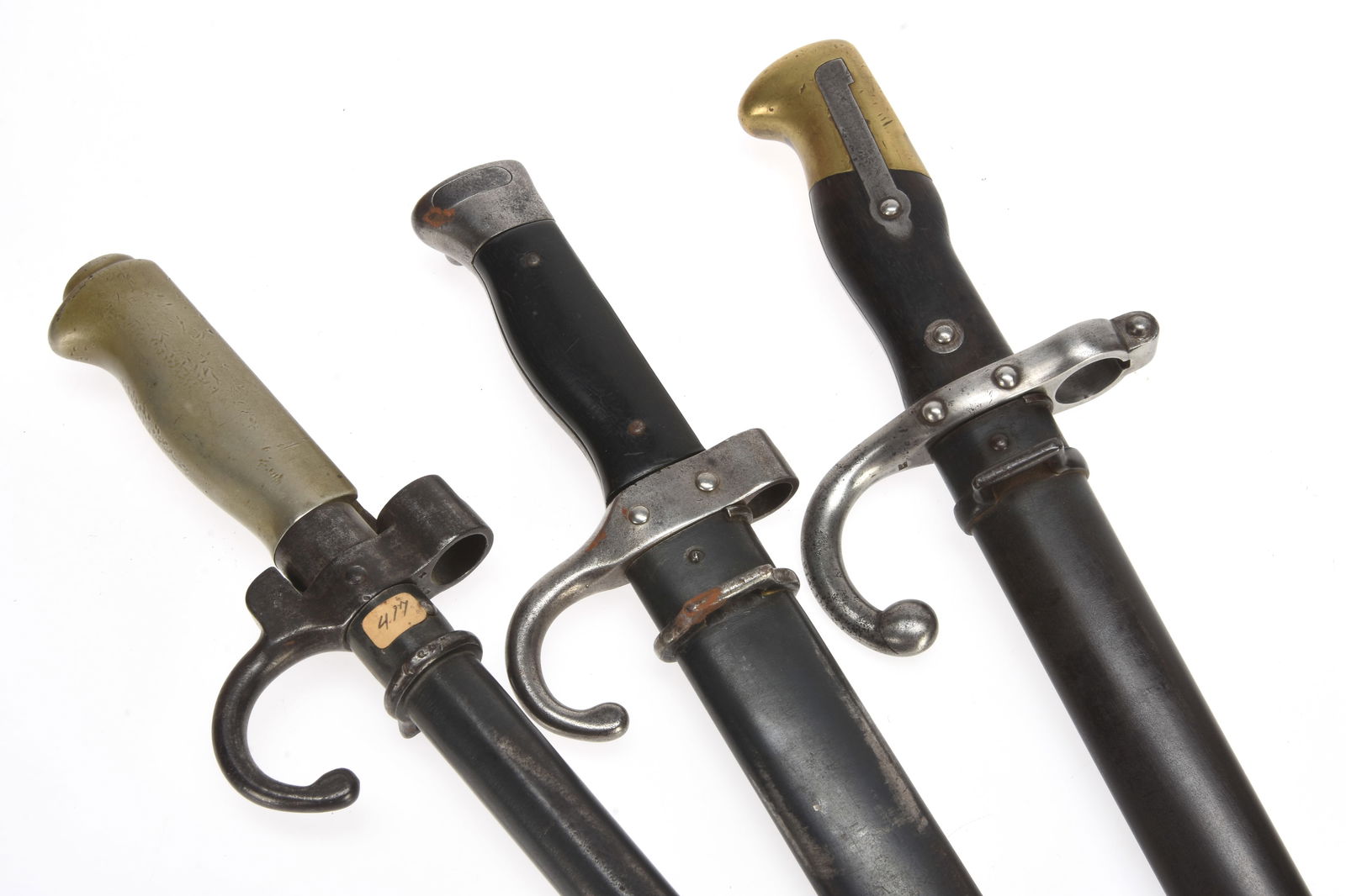 French WWI Bayonets Lot of Three: Lebel, Gras, and Berthier: French WWI Bayonets Lot of Three: Lebel, Gras, and Berthier Lebel Model 1886/ Bayonet has white metal alloy hilt with hook quillon, 52cm (20-3/8") quadrilateral blade blade with dark age blemishes and