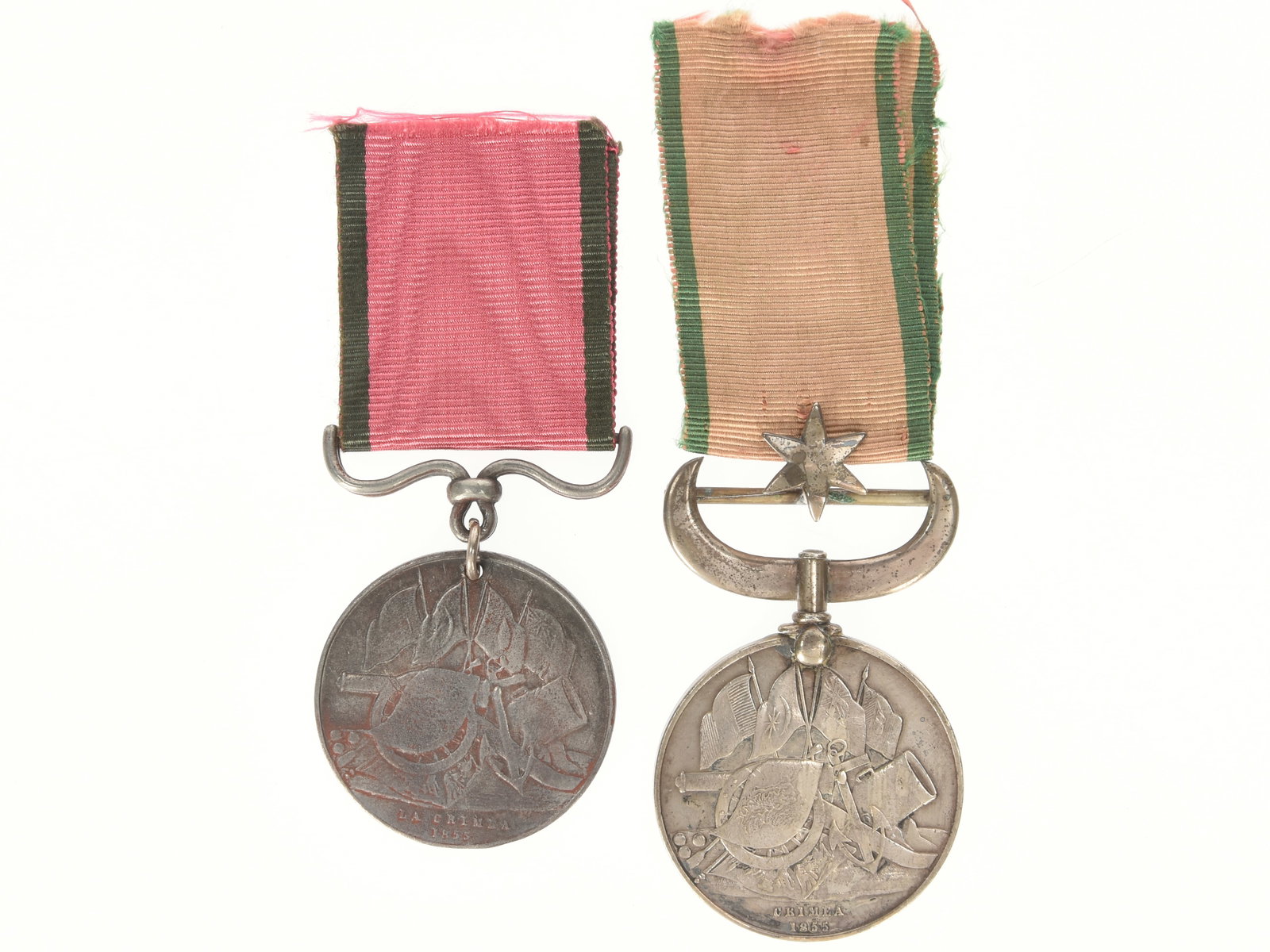 Pair of Turkish Crimean Medals: Pair of Turkish Crimean Medals. Pair of Turkish Crimean War medals including; 1.) British issue Turkish Crimean medal with "CRIMEA 1855" in exergue. Top of medal exhibits silver attachment device of s