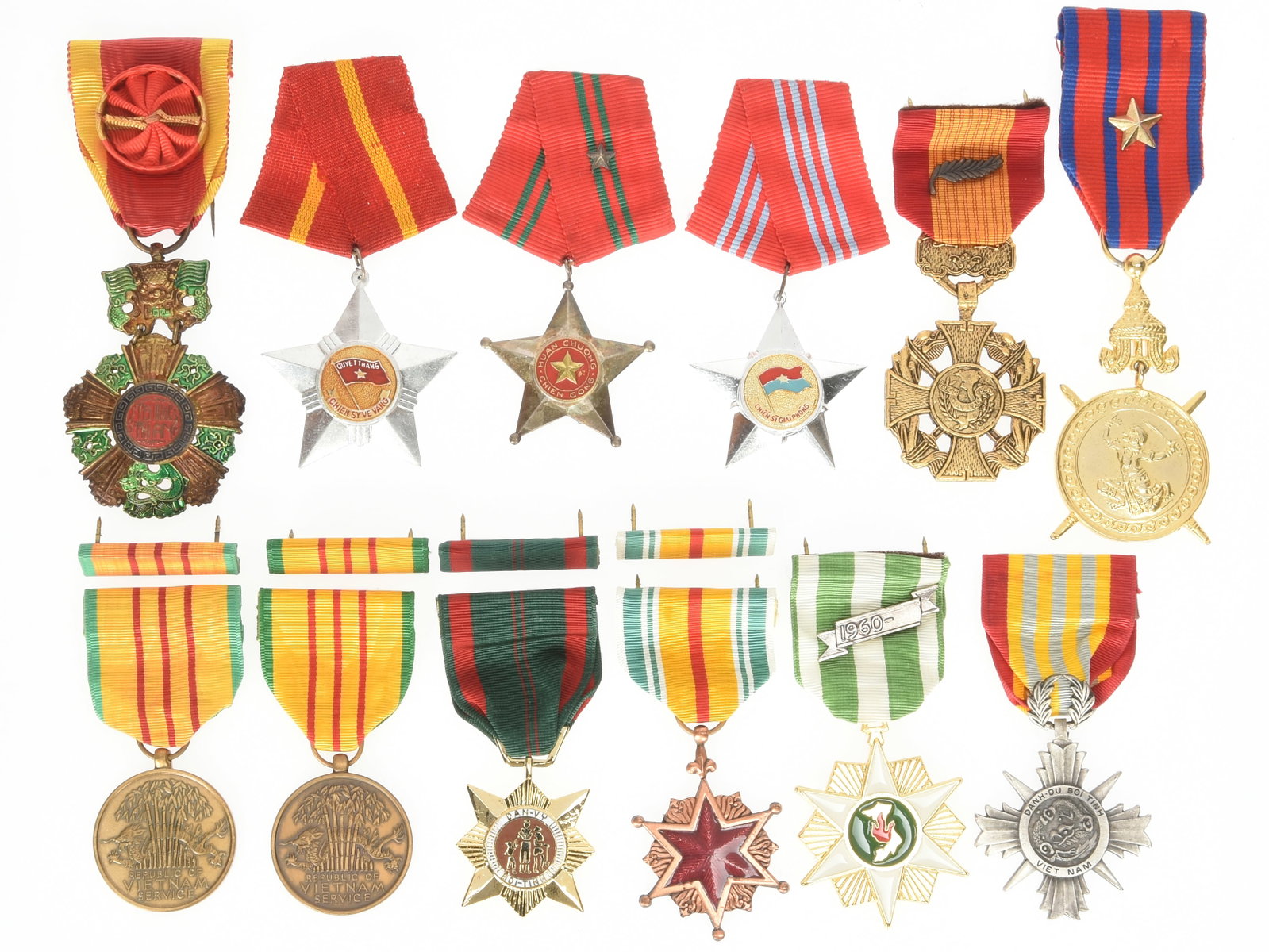 Vietnam War Related Medals: Vietnam War Related Medals Collection of South Vietnam, North Vietnam, Cambodia and United States Medals related to the Vietnam War including: 1.) Vietnamese National Order of Vietnam, Officer grade. 