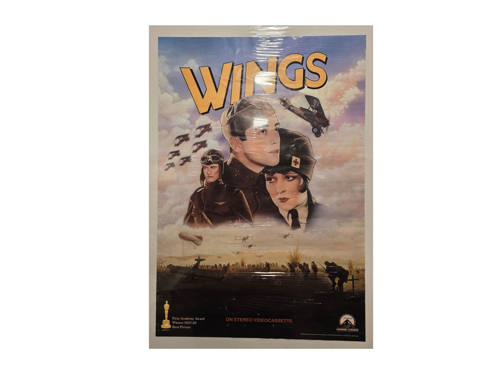 "Wings" (1927) Paramount Home Video Promotional Poster (1984 Release): "Wings" (1927) Paramount Home Video Promotional Poster (1984 Release) XXX Description: This is an original promotional poster commissioned by Paramount Home Video in 1984 to mark the historic 'Stereo