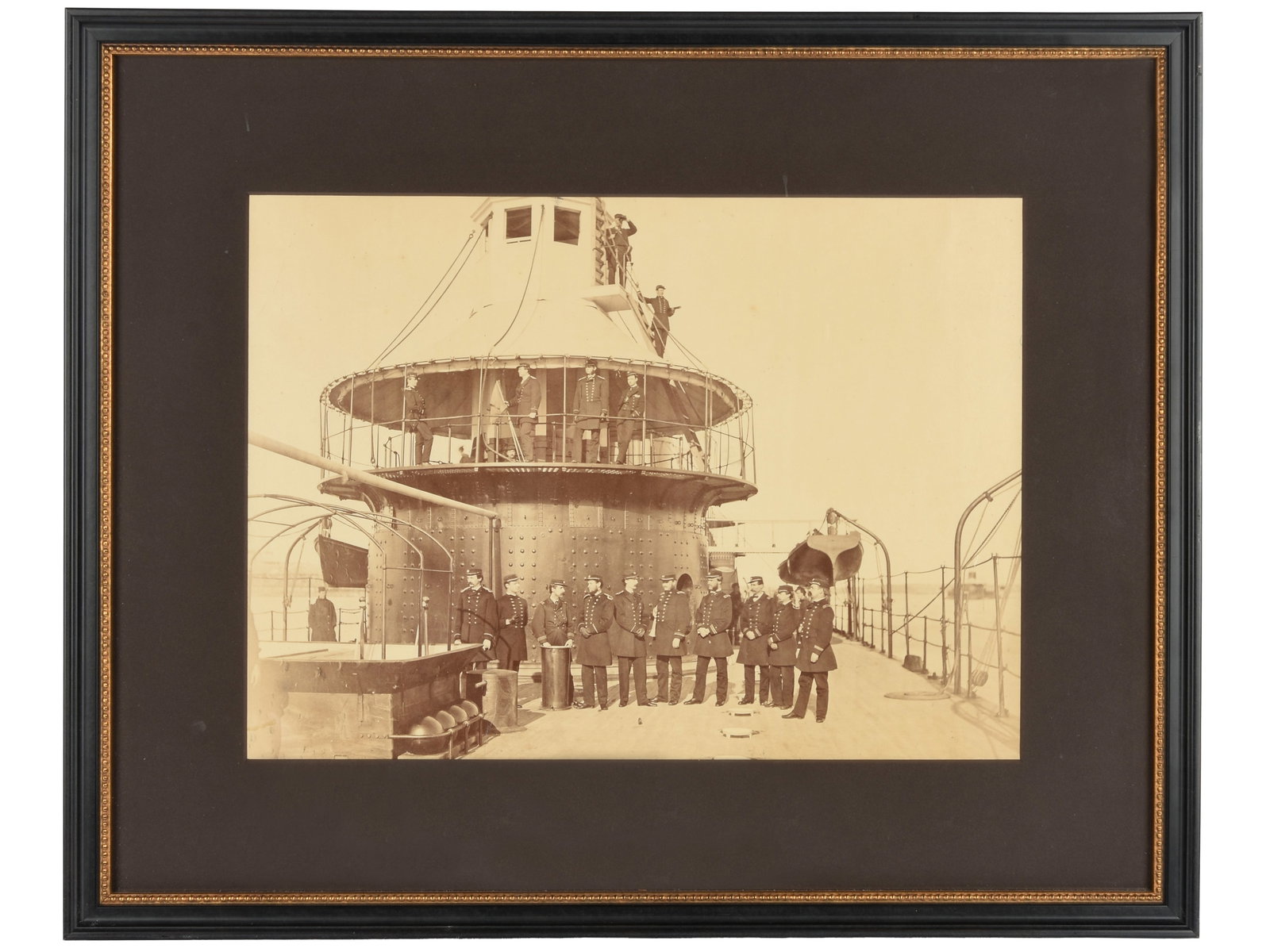 1870s Albumen Print Photo on the Deck of an Ironclad Monitor: 1870s Albumen Print Photo on the Deck of an Ironclad Monitor 15.25" x 11" matted original albumen print from the deck of a post Civil War ironclad monitor. There is no inscription or caption identifyi