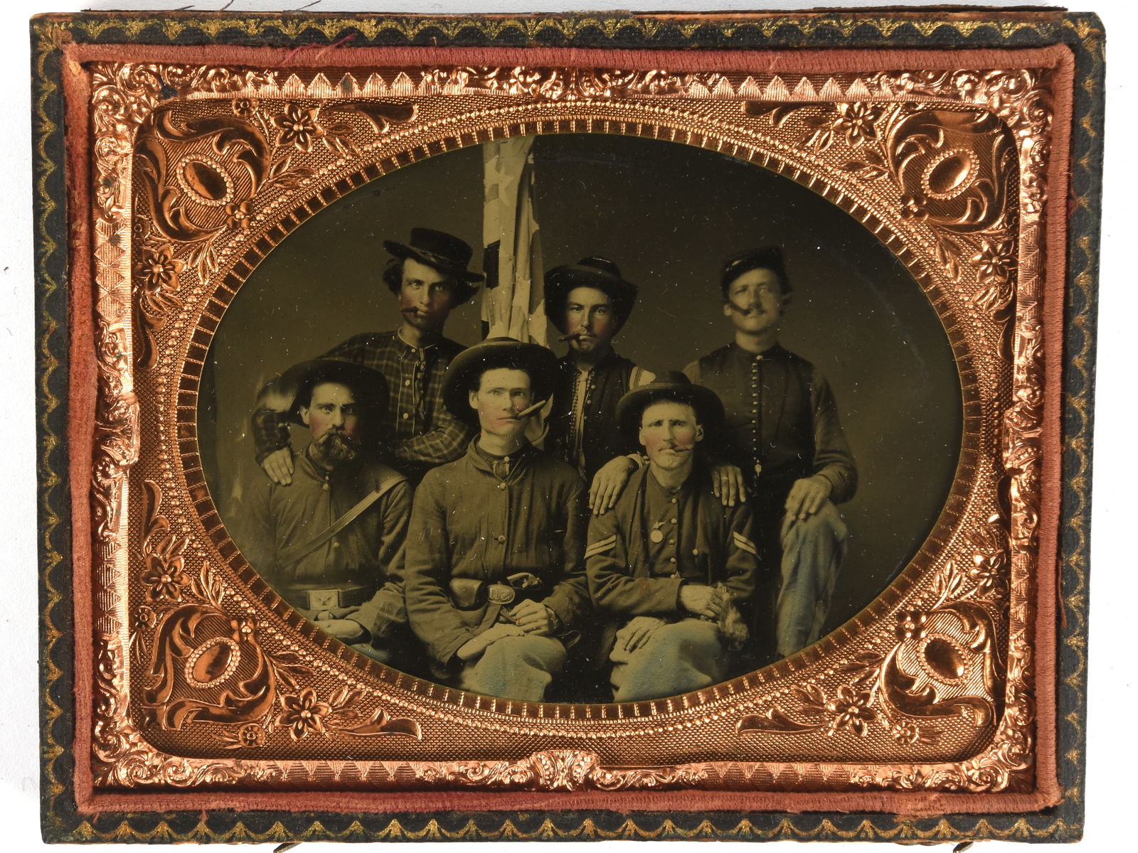 Cigars, Awesome Hats, and a Star-Spangled Banner: A Very Confident Group of Western Federal Soldiers: Cigars, Awesome Hats, and a Star-Spangled Banner: A Very Confident Group of Western Federal Soldiers. Quarter plate tintype in a broken case, though both halves are retained. Image depicts a group of