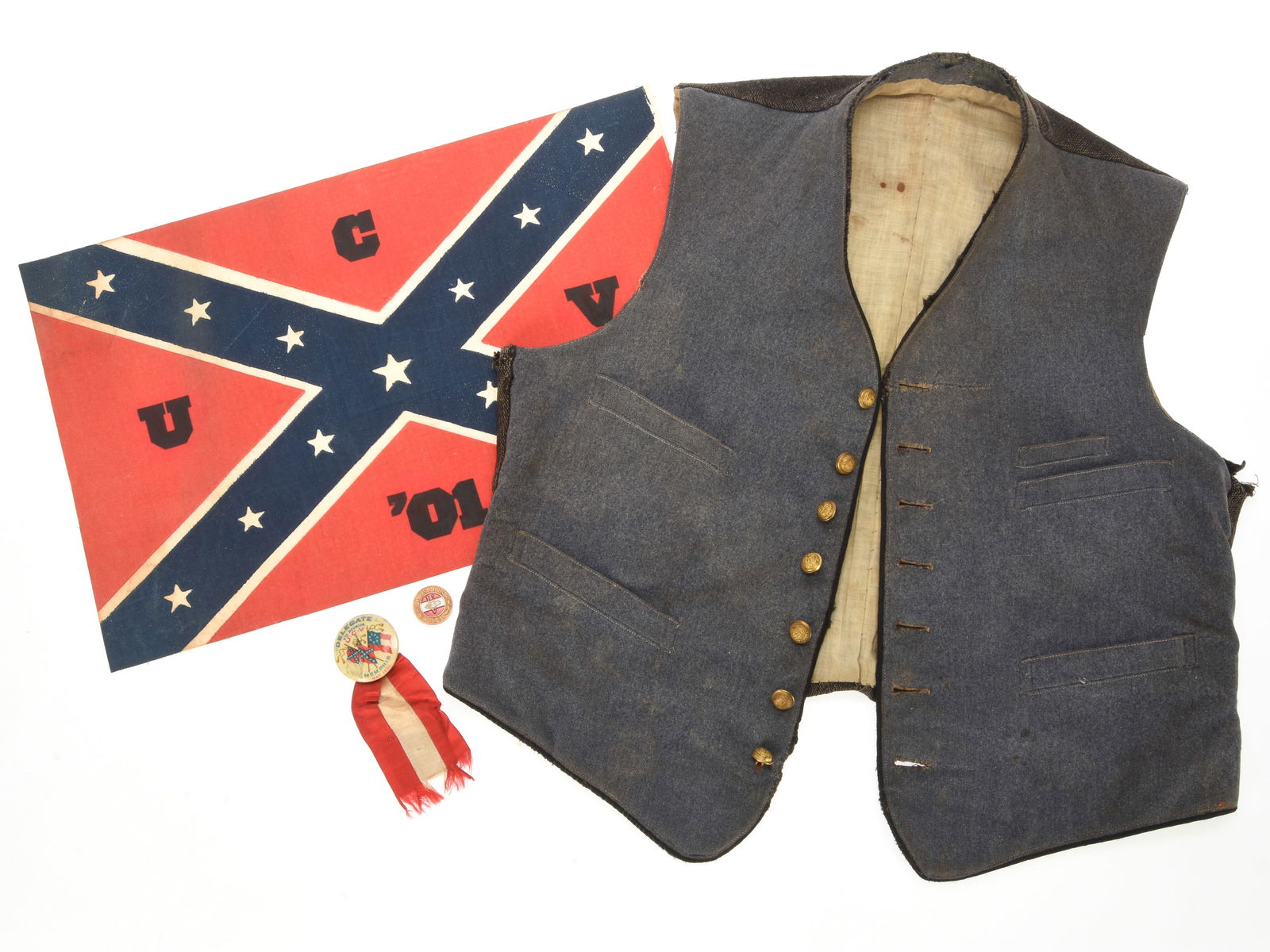 Memphis 1901 UCV Confederate Veteran Reunion Flag, & Badge Lot: Memphis 1901 UCV Confederate Veteran Reunion Flag, & Badge Lot Lot includes 17-3/4" x 11-1/2" screen printed Confederate flag with "U / C / V / 01" black letter and numerals in the angles of the cross