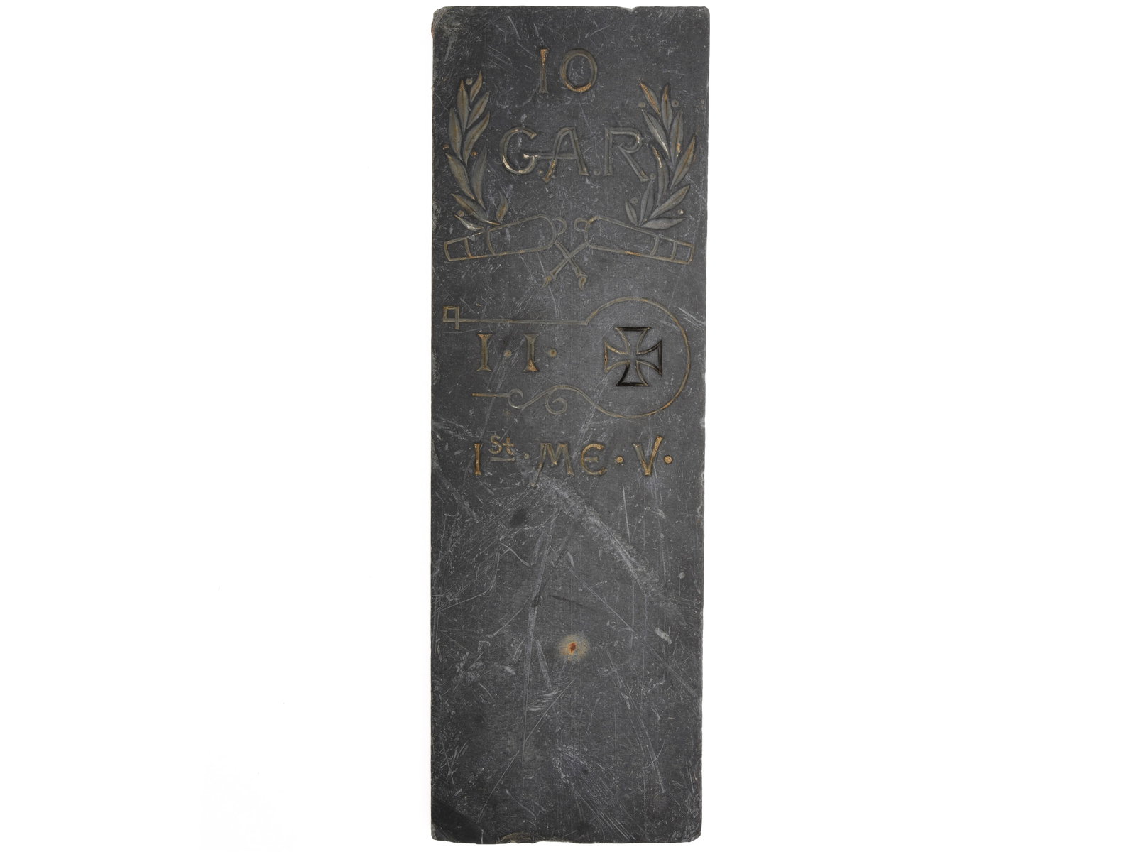 1st Maine Volunteers Grand Army of the Republic Slate Marker: 1st Maine Volunteers Grand Army of the Republic Slate Marker. 6" wide x 18" tall x 1" thick, rectangular slate marker is engraved with "10 / G.A.R." wreathed designation with cannon tubes below, "I.I.