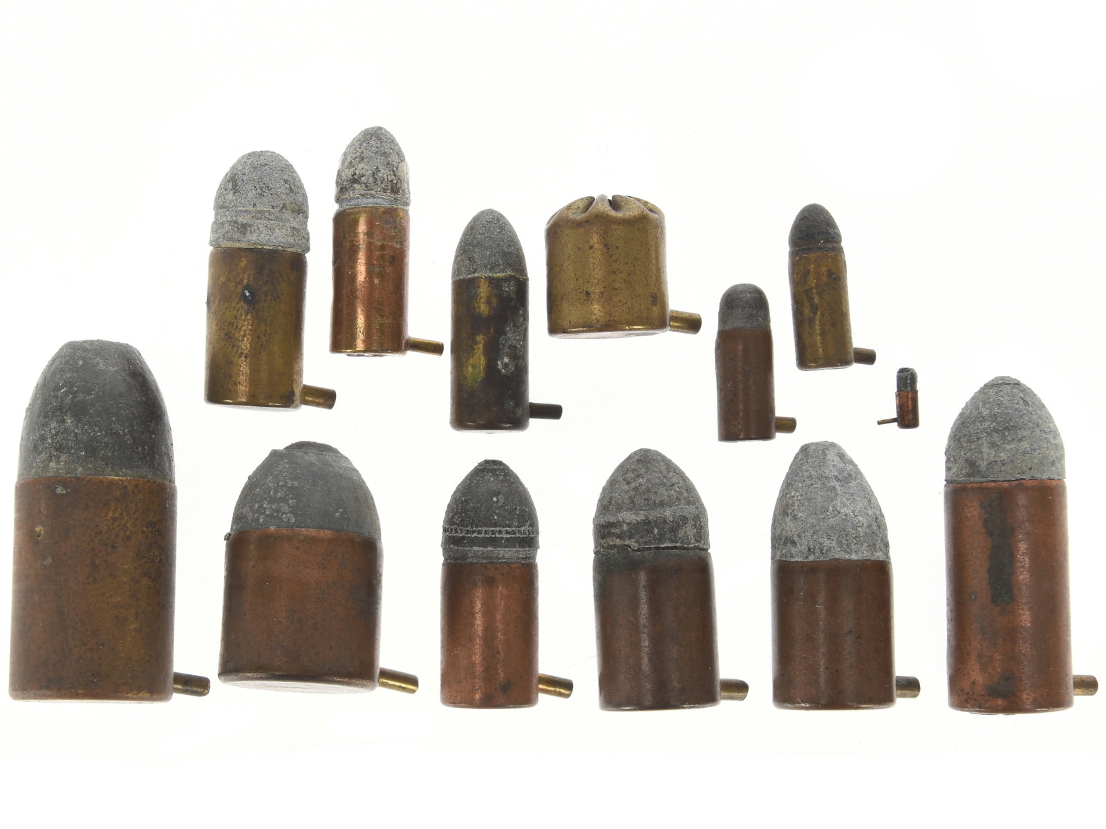 European Pinfire Revolver And Rifle Cartridge Lot: European Pinfire Revolver And Rifle Cartridge Lot. A representative group of 19th century European pinfire cartridges, mounted individually for display and identified by caliber and type. The lot incl