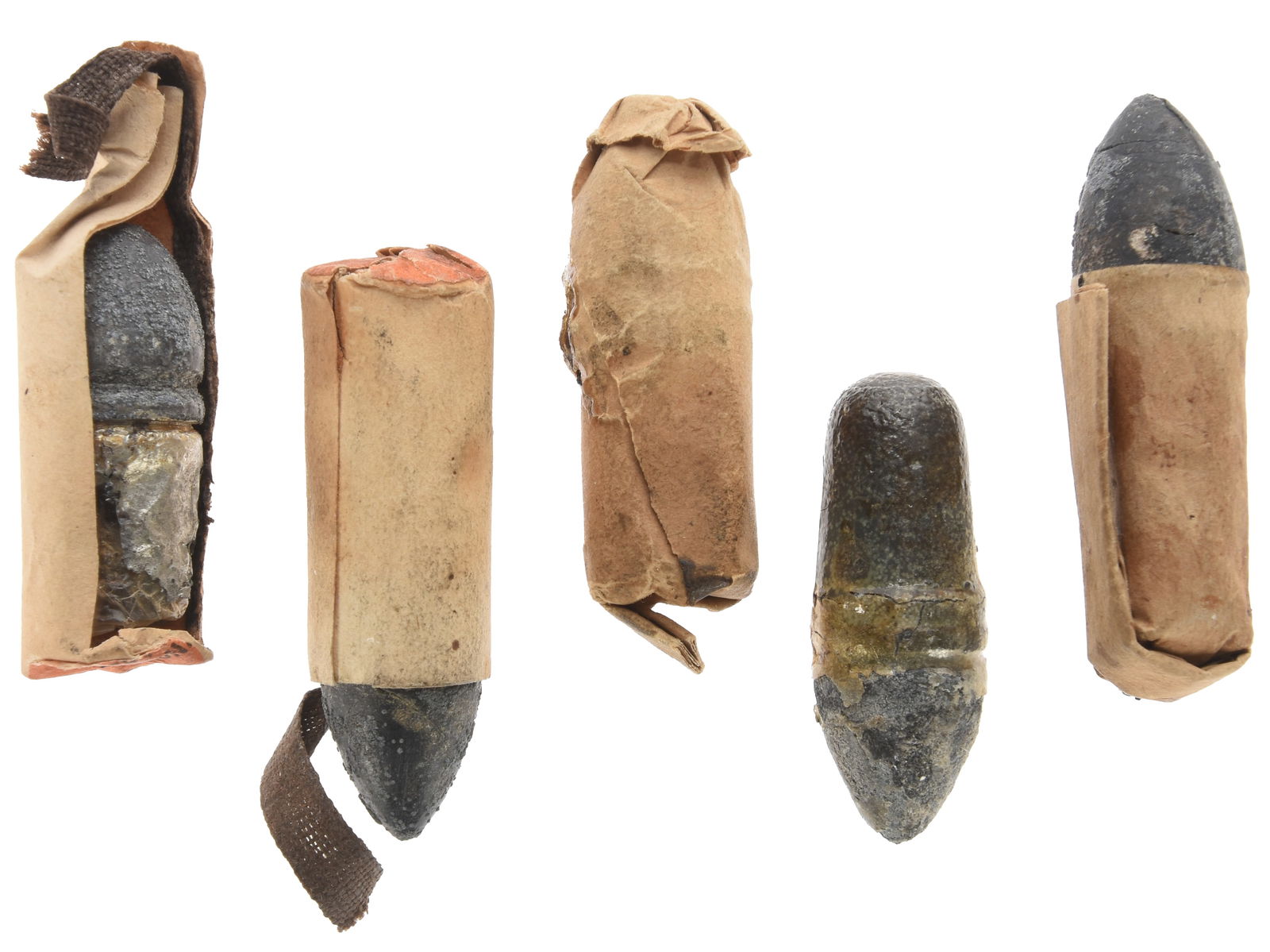 Civil War Era .44 Revolver Combustible and Compressed Cartridges: Lot of Five: Civil War Era .44 Revolver Combustible and Compressed Cartridges: Lot of Five This lot comprises five original .44 caliber percussion revolver cartridges illustrating key variants of mid?19th?century