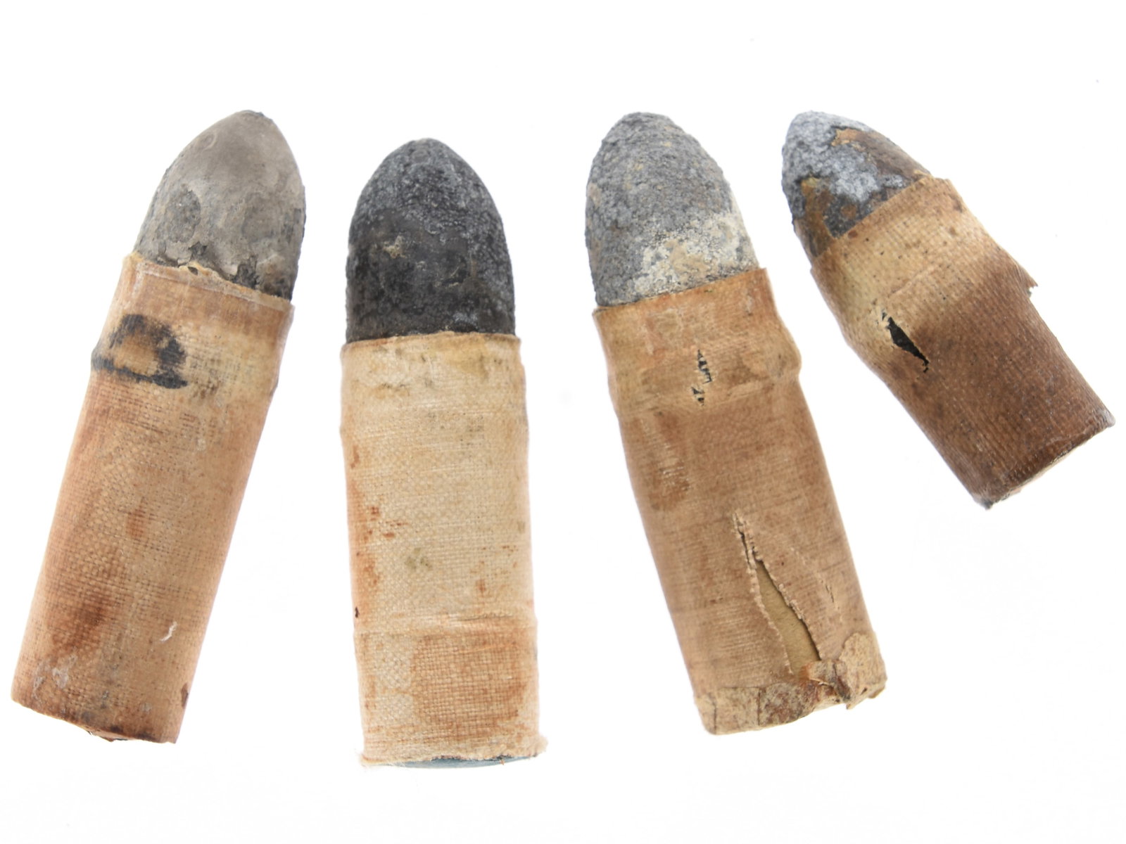 Four Civil War Starr and Cosmopolitan Carbine Cartridges: Four Civil War Starr and Cosmopolitan Carbine Cartridges. This lot comprises four Civil War–era breech-loading carbine cartridges representing two important but relatively limited-production Federal