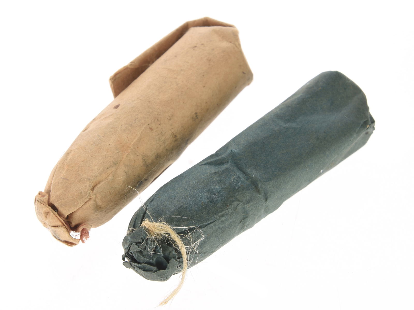 Civil War .58 Caliber Rifle-Musket Cartridge Lot: One Cartridge and One Williams 'Cleaner' Round: Civil War .58 Caliber Rifle-Musket Cartridge Lot: One Cartridge and One Williams 'Cleaner' Round Two original paper cartridges for the US .58 M1855 / M1861 / M1863 rifle-muskets; one a standard .58 Bu