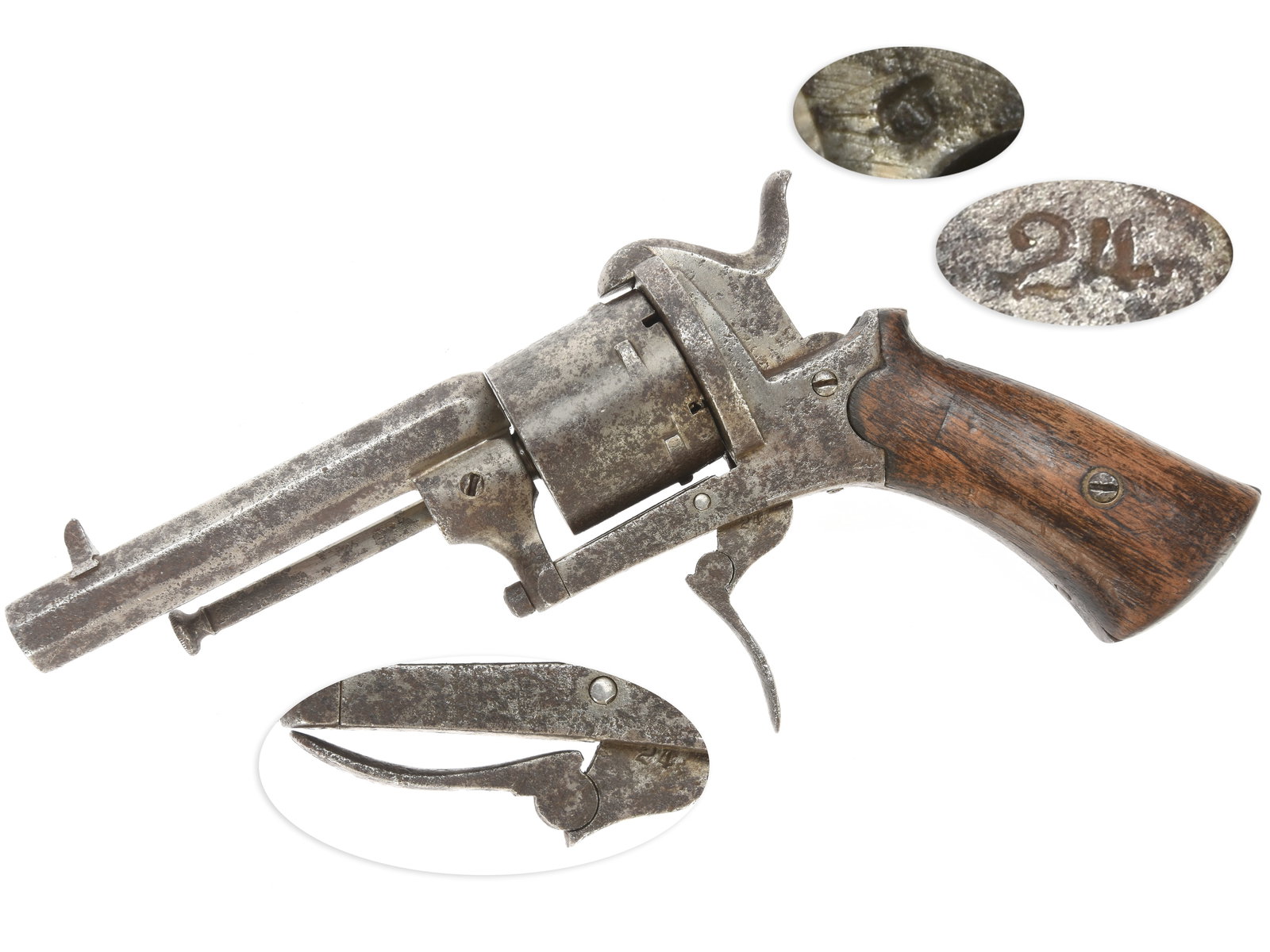 Folding Trigger 7mm Pinfire Revolver: 7mm Pinfire. 3.25” octagonal barrel. S/N: None Visible. No finish, smooth two-piece hardwood grips. Folding trigger double action pinfire revolver with loading gate, ejector rod, hammer nose not