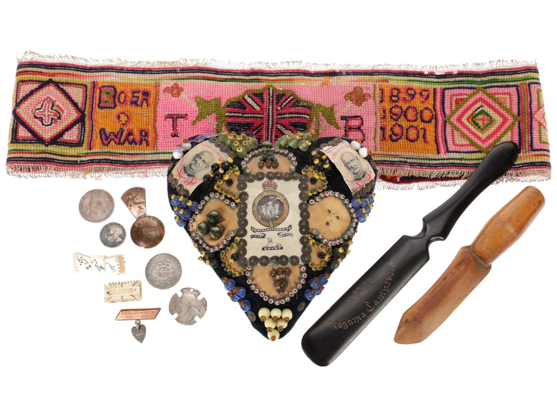 Boer War Era Memorabilia Lot: Boer War Era Sweetheart Pin Cushion: The Northhamptonshire Regiment. These were available in kit form, allowing the serviceman constructing it to incorporate unit insignia and woven or embroidered sen
