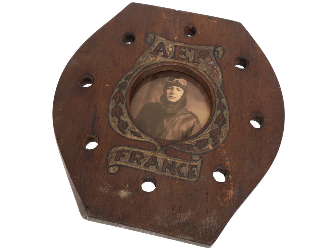 WWI Propeller Hub Picture Frame with Aviator Photo, AEF France: WWI Propeller Hub Picture Frame with Aviator Photo, AEF France Measures 19.3cm x 20.5cm. Has some wear but still displays well. Poor guy looks scared to death! Modern hanger on the reverse.