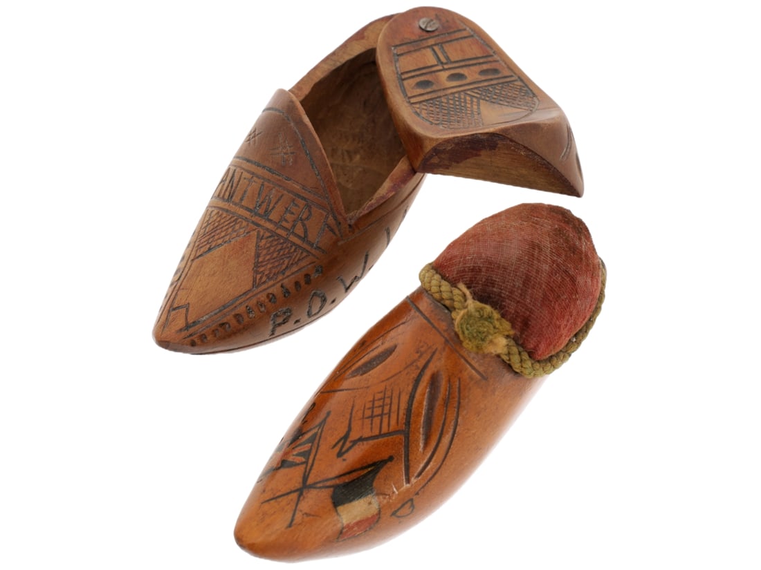 WWI Royal Naval Division POW Carved Pincushion and Box Lot - Hawke Battalion: WWI Royal Naval Division POW Carved Pincushion and Box Lot - Hawke Battalion Two pieces, first is a wooden container carved into the form of a traditional Dutch wooden shoe. It's actually quite shapel