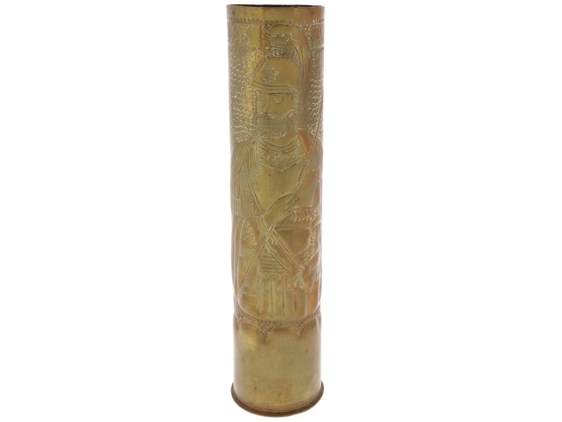 Greco-Turkish War Trench Art Shell: Greco-Turkish War Trench Art Shell French 75mm shell casing stands 35cm tall, with repousse work depicting a traditional armored Byzantine warrior; inscription in Greek along the top with "1453" date.