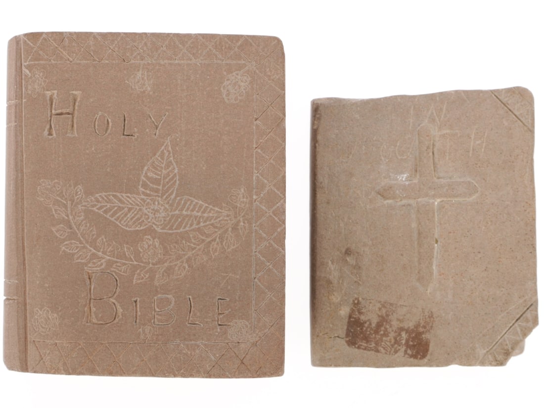 Boer War Trench Art Stone Bibles - Siege of Ladysmith: Boer War Trench Art Stone Bibles - Siege of Ladysmith Two bibles carved from brownish-pink local stone by Boer POWs. 1) Measures 5 x 6 cm with a distinct spine. The cover inscribed HOLY BIBLE with a d