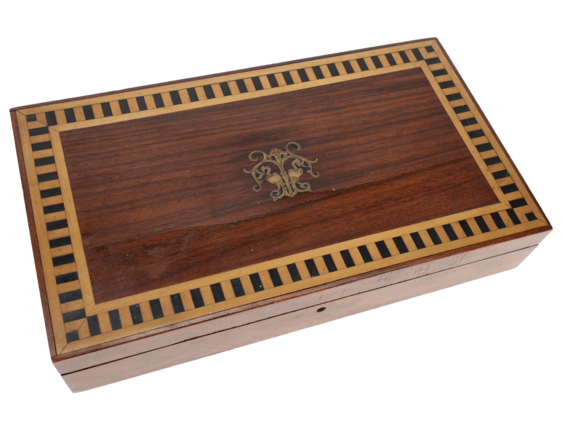 POW Made Jewelry Box - Camp I, Knockaloe: POW Made Jewelry Box - Camp I, Knockaloe 23.7 x 13.4 x 4.2 cm walnut wood jewelry box with an intricately inlaid lid. The edge of the lid is decorated with a band of alternating light and dark wood. I