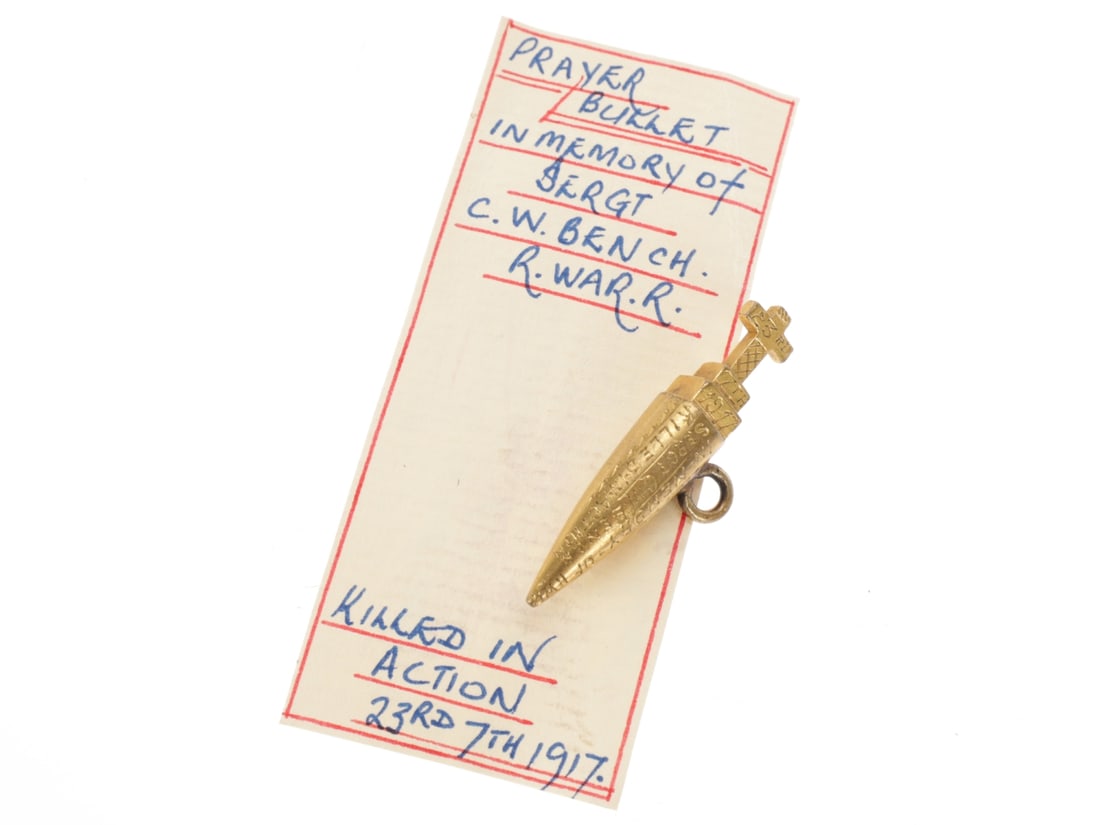 WWI Soldier's Memorial Pendant Charles Wm. Bench KIA Ypres: WWI Soldier's Memorial Pendant Charles Wm. Bench KIA Ypres 40mm long bullet has been carved into a prayer bullet with a cross on a dais. The bullet had been plated and is inscribed IN - MEMORY - OF / 