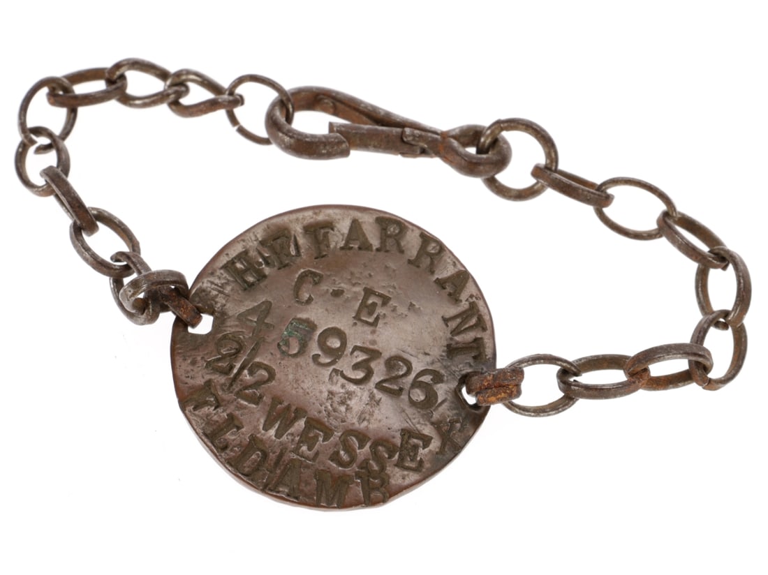Royal Army Medical Corps Soldier's ID Bracelet: Copper disc is stamped H.F. FARRANT / CE / 459326 / 2/2 WESSEX / FLD AMB. It has a wristband of steel links that fasten with a snap hook. Harry Fred Farrant started the war with service number 2171 bu