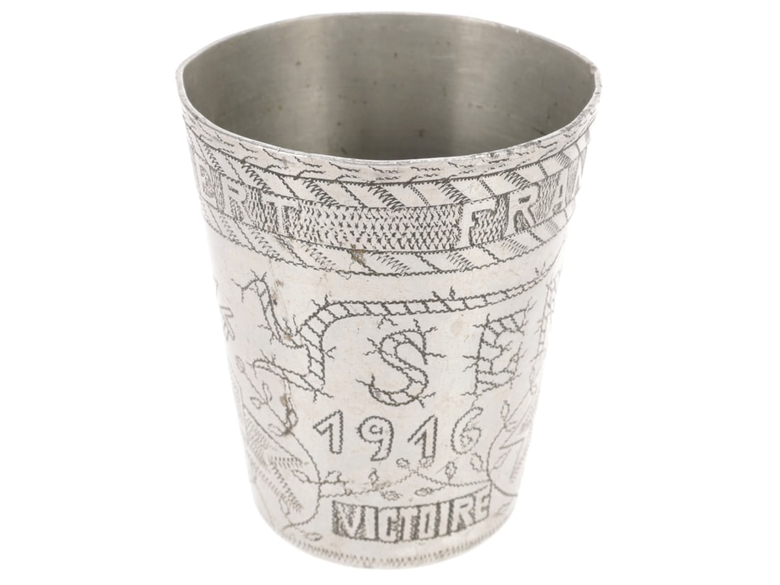 Belgian Yser Front Trench Art Aluminum Cup: Belgian Yser Front Trench Art Aluminum Cup Aluminum drinking cup has a 43mm base, 62mm rim and stands 76mm tall. It is engraved FRANCOIS THYBAERT below the rim and YSER 1916 VICTOIRE. The other side i