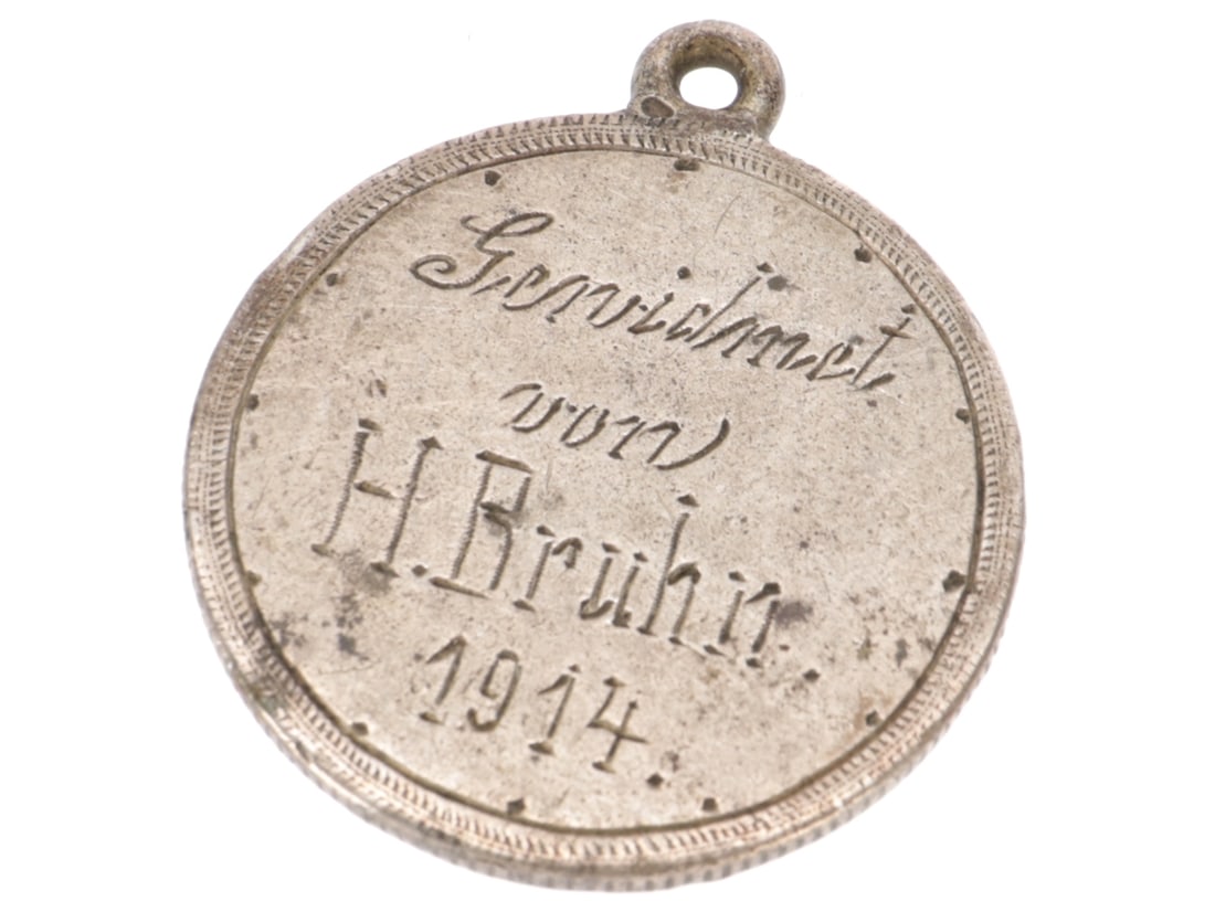 German Soldier KIA Love Token: German Soldier KIA Love Token 1901 German 2 Mark silver coin, the reverse has been smoothed down and re-engraved GEWIDMET VON H. BRUHNE 1914. A loop has been applied to the upper rim for a cord or cha