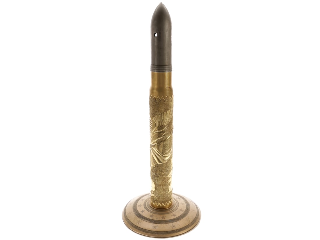 US Eagle & Flag Trench Art Lamp (USN 3-inch/50 caliber) Shell: US Eagle & Flag Trench Art Lamp (USN 3-inch/50 caliber) Shell. 27" tall including an 11" diameter brass base, with nickel finish 'projectile' that has been drilled but not tapped for lamp arms that we