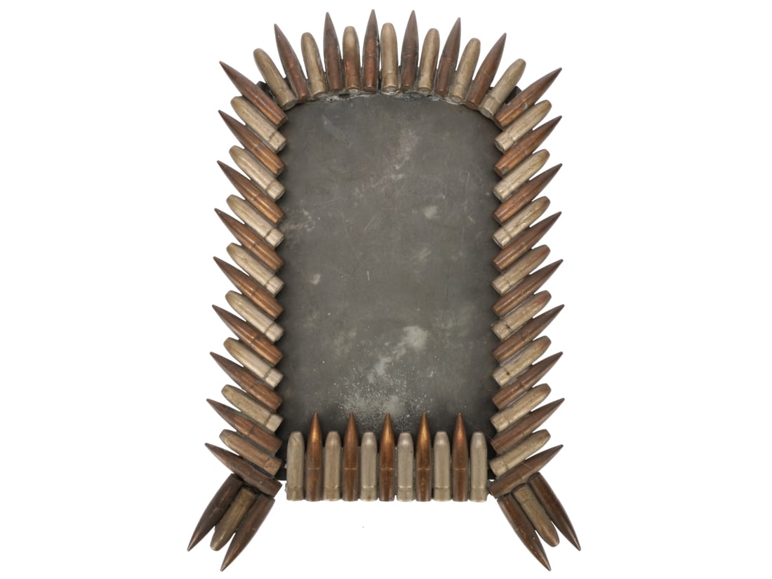 Trench Art Picture Frame of Bullets: Trench Art Picture Frame of Bullets Heavy 25 x 17.5 cm frame of alternating copper jacketed spitzer point bullets and cupro-nickel jacketed round nose rifle bullets. They are soldered together around 