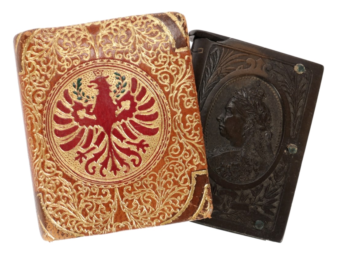 Leather and Vulcanite Commerically Made Match Safes: Leather and Vulcanite Commercially Made Match Safes Leather covered matchbox safe resembles a book with gold embossed filigree surrounding a seal in the center depicting a crowned red eagle. The eagle
