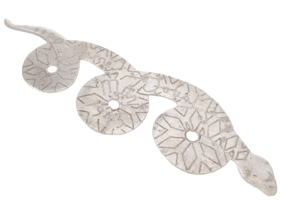WWII Souvenir "Diary Snake" Carving - Guadalcanal 1943: WWII Souvenir "Diary Snake" Carving - Guadalcanal 1943 One piece of sheet aluminum cut into the shape of a snake in three coils. The obverse is engraved with "snakey" diamond pattern, the name GENE FO