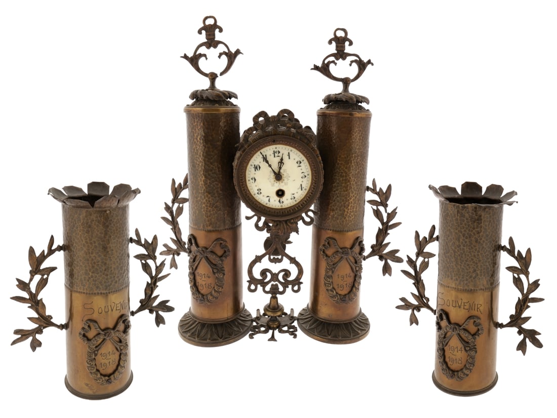 1914-1918 Souvenir Trench Art Mantle Clock Garniture Set: 1914-1918 Souvenir Trench Art Mantle Clock Garniture Set. A trench art clock garniture, a so?called garniture de cheminee, comprising a mantel clock with two matching vases. The clock is made from two