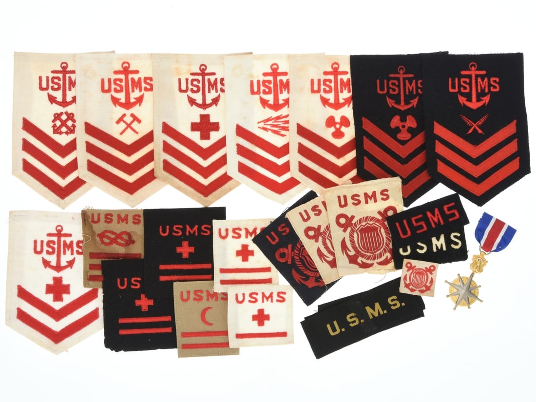 WWII US Merchant Marine Rating Badge & Specialist Insignia Lot: WWII US Merchant Marine Rating Badge & Specialist Insignia Lot. 20+ items including US Maritime Service enlisted rating badges, one (post-war issue) Merchant Marine Distinguished Service Medal, an