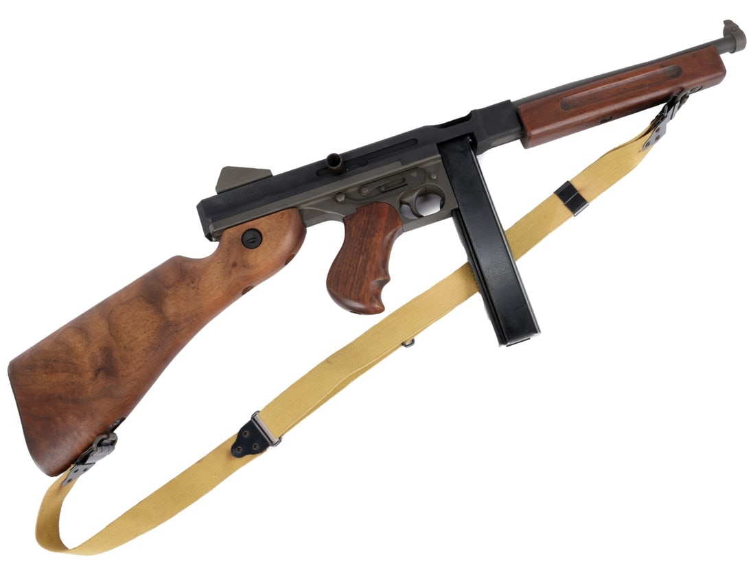 WWII US M1A1 Thompson SMG: Nonfunctional Display Dummy Gun: WWII M1A1 Thompson Submachine Gun: Display Piece With Non-Firing Receiver Original M1A1 Thompson SMG with walnut forestock and buttplate which opens to accept a standard oiler, second pattern rear sig