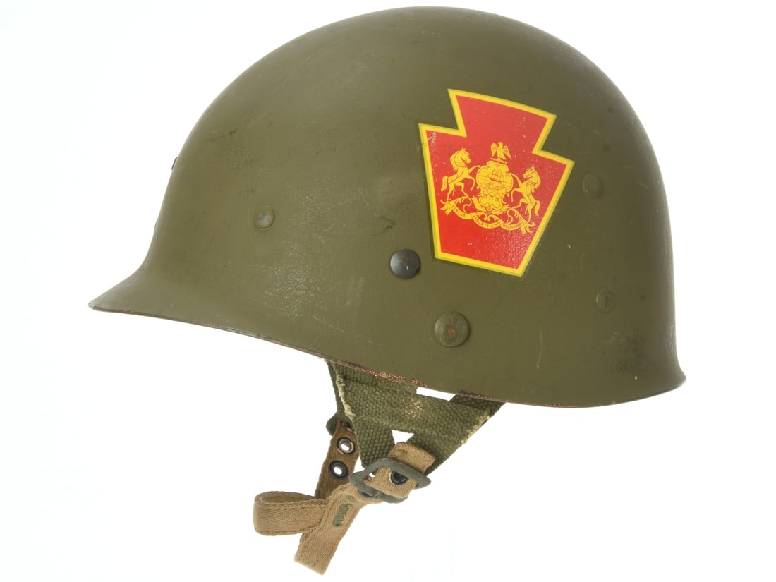 WWII US Airborne Helmet Liner; Reissued With post-War National Guard Decals: WWII US Airborne Helmet Liner; Reissued With post-War National Guard Decals. Westinghouse high pressure airborne liner for the M1 helmet has light olive web suspension, dark olive 'A' frame straps wit