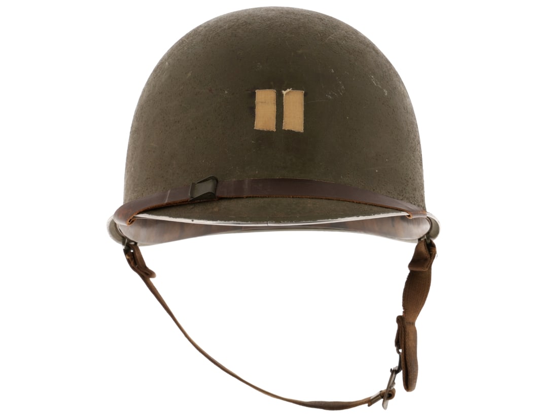 US M1 Helmet With Medical Tape Captain's Bars: US M1 Helmet With Medical Tape Captain's Bars. Early production fixed loop M1 helmet has original textured olive drab finish with an enlisted serviceman's initial and partial serial number stencil on 