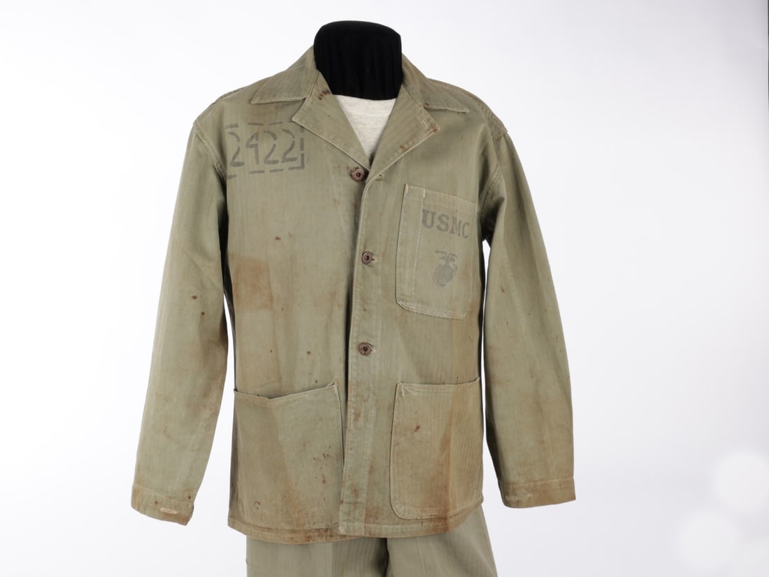 USMC 5th Marine Division Corporal's P1944 HBT Coat w/ Tactical Marking & P41 Trousers: USMC 5th Marine Division Corporal's P1944 HBT Coat w/ Tactical Marking & P41 Trousers Well-worn and stained from field use, this Pattern 1944 Marine Corps HBT utility coat has "2422" tactical rank