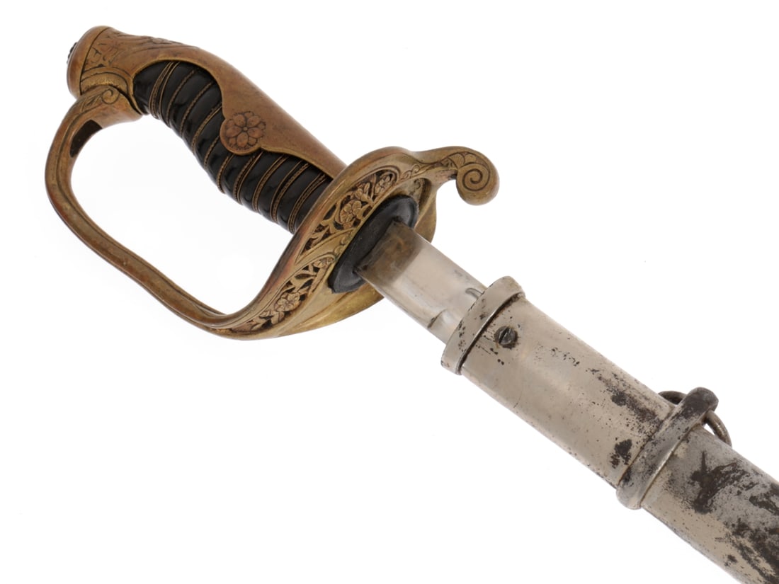 Japanese WWII Army Officer's Type 19 Sword: Japanese WWII Army Officer's Type 19 Sword. Type 19 company grade kyu-gunto parade sword has 75cm long fullered, machine-made blade in good polish with a few minor blemishes but nice overall; ricasso 