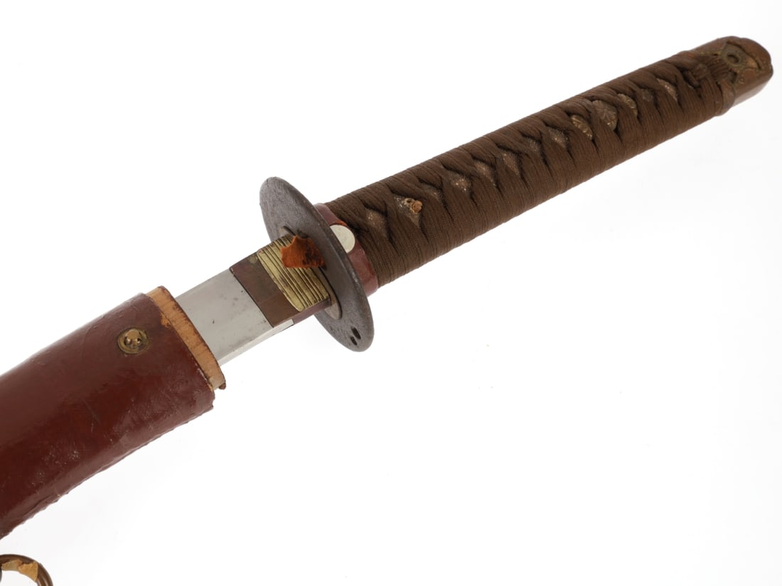 Japanese WWII Army Officer's Shin-gunto with Scabbard & Leather Cover: Japanese WWII Army Officer's Shin-gunto with Scabbard & Leather Cover. 65cm (25-1/2") wartime production factory forged blade remains in good polish with a few minor blemishes near the tip, with a