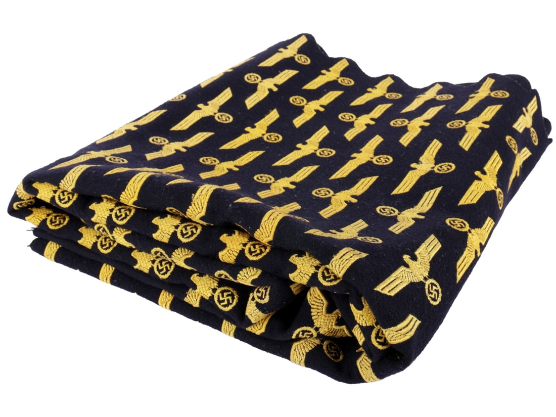 Kriegsmarine Enlisted Breast Eagles: Uncut Sheet of 330 Examples: Kriegsmarine Enlisted Breast Eagles: Uncut Sheet of 330 Examples Dark blue wool background has yellow gold machine embroidered Kriegsmarine breast eagles as worn on the blue service uniform. Segment i
