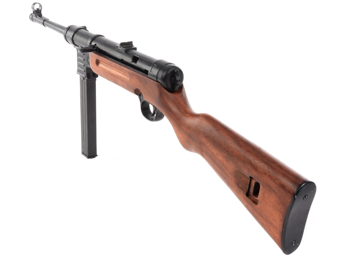 Replica Non-Firing German MP41 Sub Machine Gun: Replica Non-Firing German MP41 Sub Machine Gun. Replica MP41 for display purposes with a moving bolt and "working" action that allows the bolt to move. Includes a single nonfunctional magazine. Very