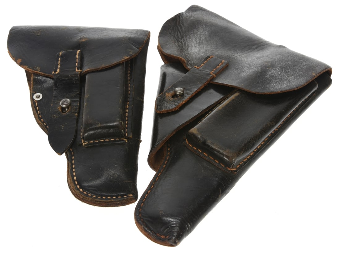 WWII German Pistol Holster Lot: P38 and PPK: WWII German Pistol Holster Lot: P38 and PPK. P-38 holster has black leather which shows wear but remains in good condition and is Pecard-free; reverse is well marked with nomenclature, waffenamt, and