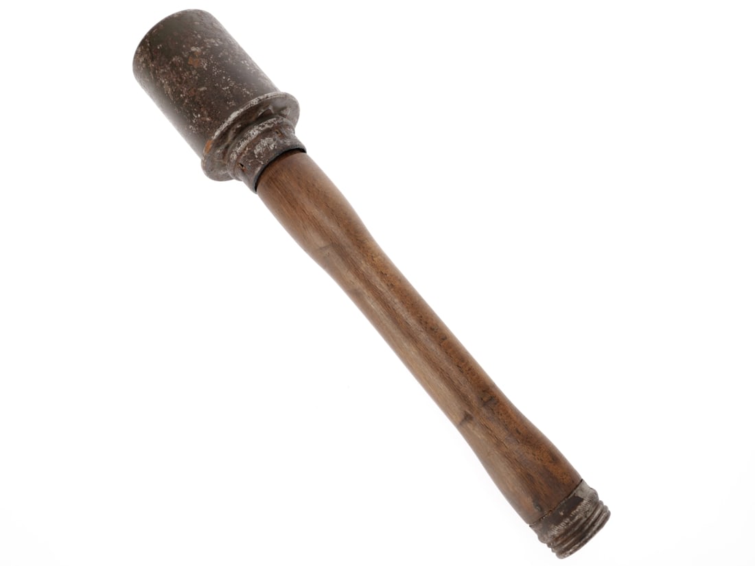 German WWII M24 Stick Grenade (Inert): German WWII M24 Stick Grenade (Inert) INERT 35.5cm (14") long M24 stick grenade has stamped metal warhead with ~30% field gray painted finish blending with dark steel patina where worn. Warning