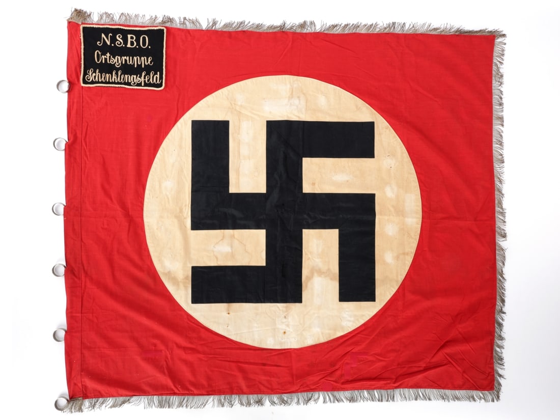 Third Reich NSBO Ortsgruppe Schenklengsfeld Banner: Third Reich NSBO Ortsgruppe Schenklengsfeld Banner. 125cm x 135cm inclusive of bullion fringe, multipiece cotton bunting banner has suspension rings attached on the hoist side with the uppermost ring 