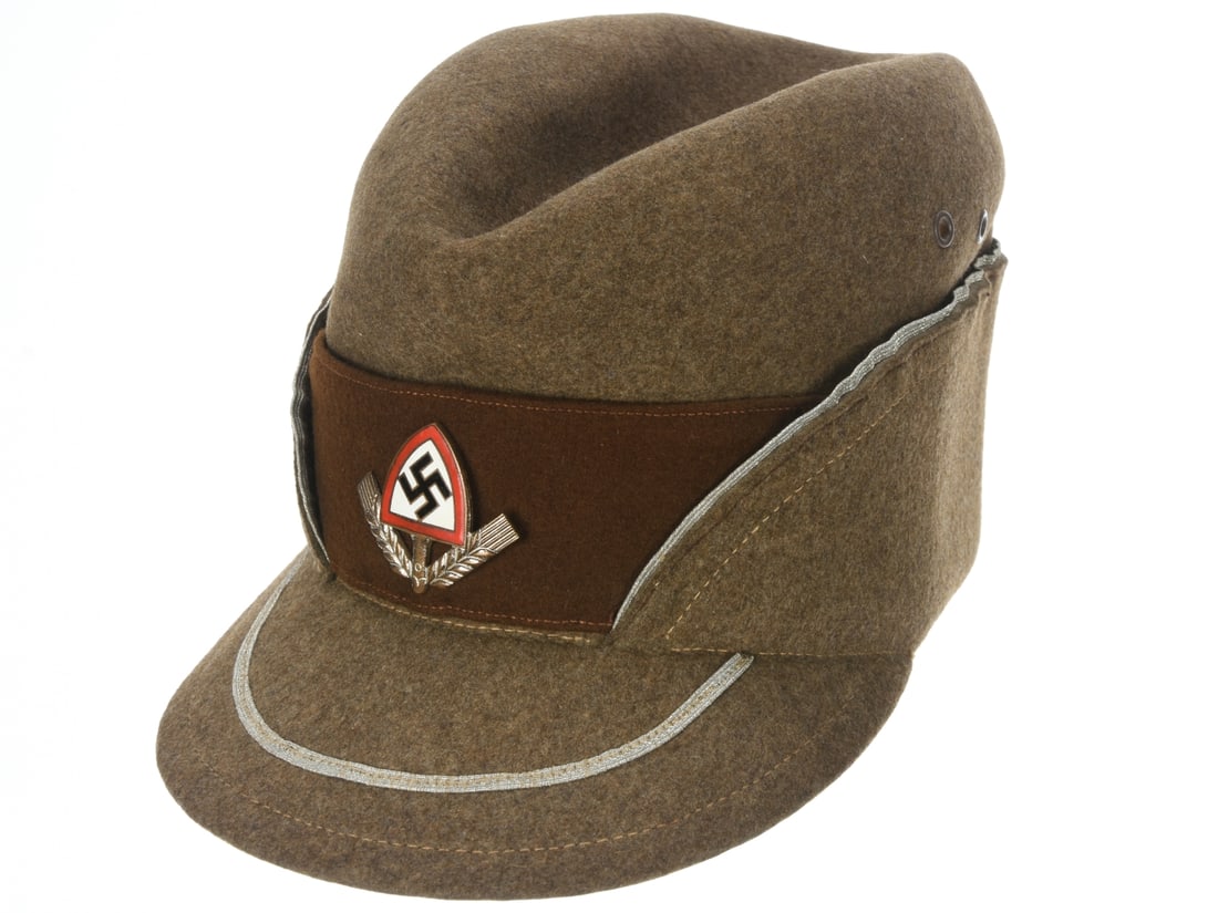 Reich Labor Service Officer Cap: RAD Officer Cap. Reichsarbeitsdienst officer cap of RAD olive-brown wool felt has silver bullion piping and dark brown band with enamel RAD badge. Interior has white silk lining, nice condition tan le