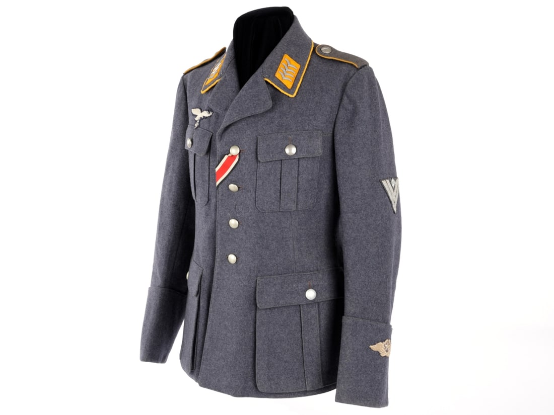 Luftwaffe Stabsgefreiter M35 Tuchrock: Luftwaffe Stabsgefreiter M35 Tuchrock. Luftwaffe blue gray wool issue M35 tuchrock has Stabsgefreiter rank insignia, yellow flight / fallschirmj?ger waffenfarbe, and left cuff with Flight Technician s