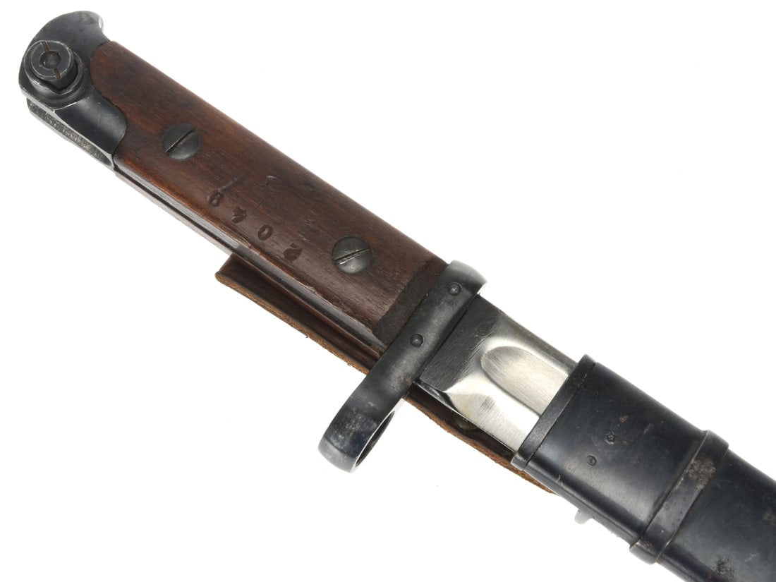 WWII Soviet M1940 Tokarev Bayonet: WWII Soviet M1940 Tokarev Bayonet 9.5" blade is finished bright with a blued ricasso, tang and pommel. Tiny proof marks on both sides of the ricasso and the upper face of the double pinned crossguard.