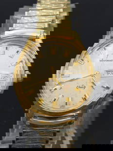 UNITED PARCEL SERVICE GOLD TONE 5 YEAR SAFE DRIVING Wittnauer watch: This vintage Wittnauer gold-tone wristwatch was awarded by United Parcel Service (UPS) in recognition of 5 years of safe driving—a testament to both achievement and craftsmanship. A classic
