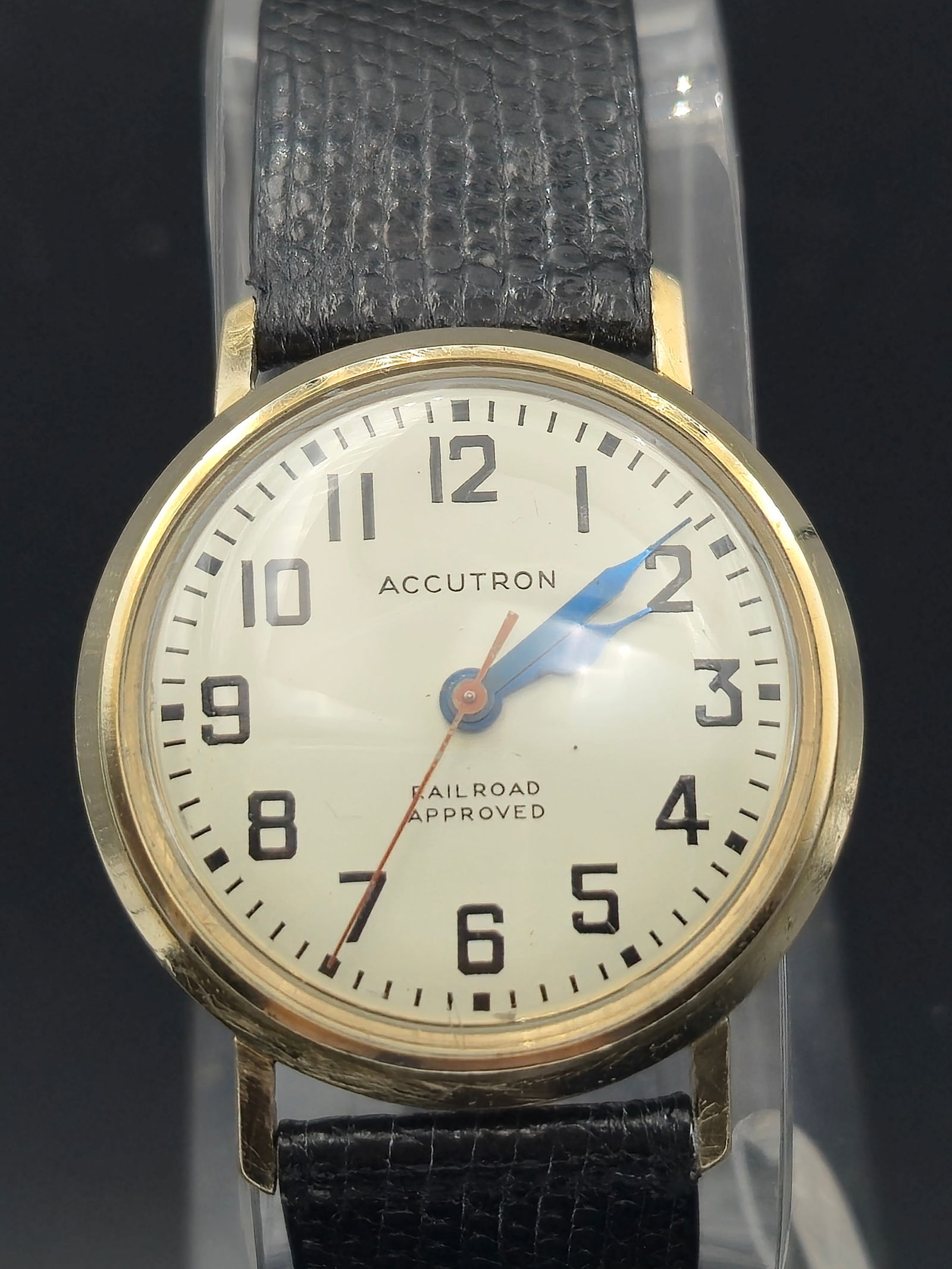 Bulova Accutron 214H Railroad Approved – 10K Gold Filled, 1967 (M7), Running: This vintage Bulova Accutron 214H Railroad Approved watch features the revolutionary tuning fork movement, housed in a 10K gold-filled case measuring approximately 34mm wide. Dated M7 (1967), it has a