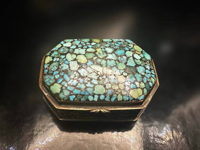 Vintage Persian Silver Filigree Box with Turquoise Mosaic Lid: A striking vintage Persian silver box featuring an octagonal form and an ornate filigree body. The hinged lid is inlaid with a beautiful mosaic of natural turquoise stones, showcasing a range of green