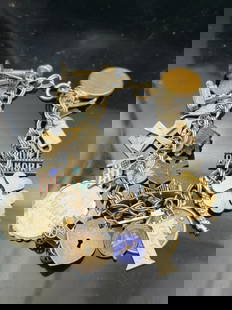 Vintage Sterling Silver Charm Bracelet – 25 All-Sterling Charms – 62.9g – Travel & Souvenir: This exceptional vintage sterling silver charm bracelet features 25 individually crafted charms, all tested or marked solid sterling silver. The bracelet has a strong travel and souvenir theme, captur
