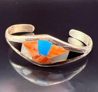 Vintage Zuni Native American Turquoise Mili Stone Inlay Cuff Bracelet: This is a vintage Zuni Native American Turquoise multi inlay stone cuff bracelet. Stones are Black Onyx, Turquoise, Mother of Pearl, and Coral. This is not signed but it is Zuni Native American with S