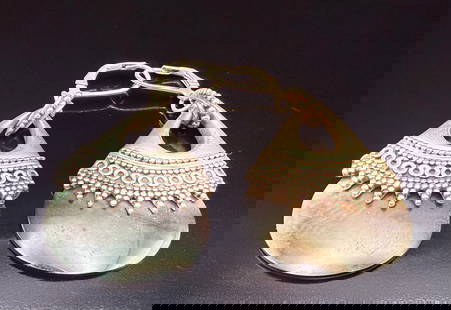 Sterling Silver Mother of Pearl Tear Drop Abalone Tear Drop Indonesia made Earrings: This is a pair of Indonesian tear drop style earrings. They are stamped with 925 and Indonesia. Beautiful design holding the Mother of Pearl piece for each earring. Hand crafted style earrings with cl