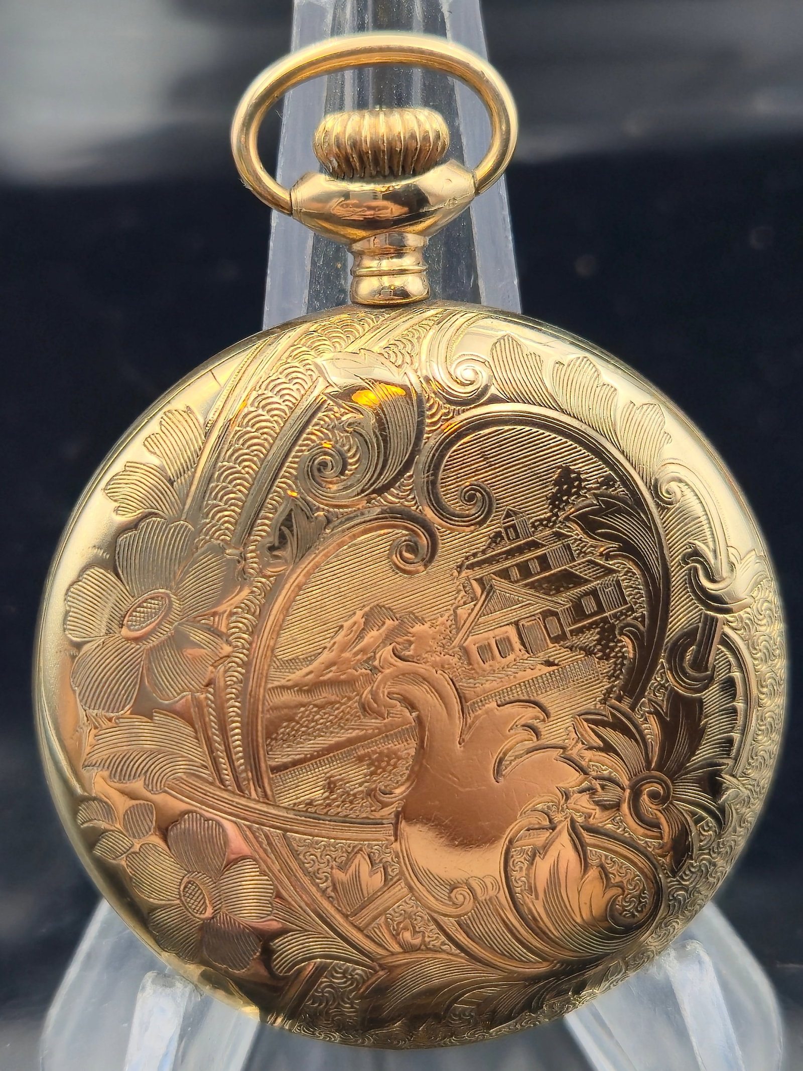 1920s Midland Swiss Pocket Watch – 10k Gold-Filled Napoleon Case, 12s: This vintage Midland pocket watch features a Swiss-made movement housed in a beautifully engraved 10k gold-filled case by the Illinois Watch Case Co. ("Elgin Napoleon" model). The caseback is adorned 